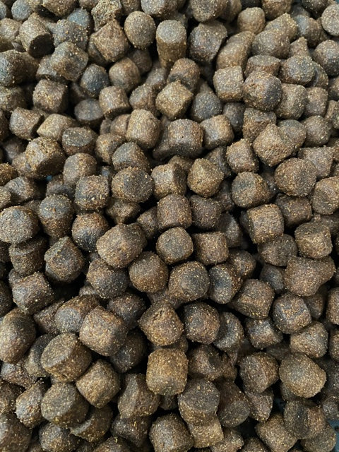 floating expander pellets used as surface fish feed. Garden pond Koi 
carp food 